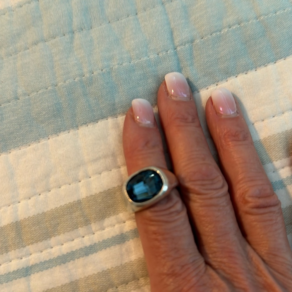 Uno de 50 ring with blue stone